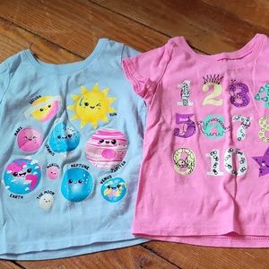 Children place t-shirts